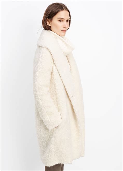 Wool bouclé jacket in off white 